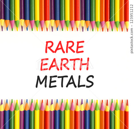Rare earth metals symbol. Concept words Rare earth metals on beautiful white paper. Beautiful white paper background. Colored pencils. Business and rare earth metals concept. Copy space. 123951212