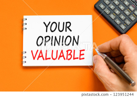 Your opinion valuable symbol. Concept words Your opinion valuable on beautiful white note. Beautiful orange background. Black pen. Businessman hand. Business your opinion valuable concept. Copy space. Your opinion valuable symbol. Concept words Your opinion valuable on beautiful white note. Beautiful orange background. Black pen. Businessman hand. Business your opinion valuable concept. Copy space. 123951244