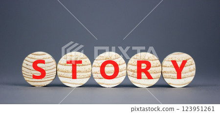Story symbol. Concept word Story on beautiful wooden circles. Beautiful grey table grey background. Business lifestyle story concept. Copy space. 123951261