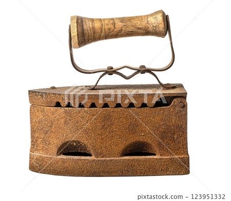 Old rusty charcoal iron isolated on white background showing history of laundry 123951332