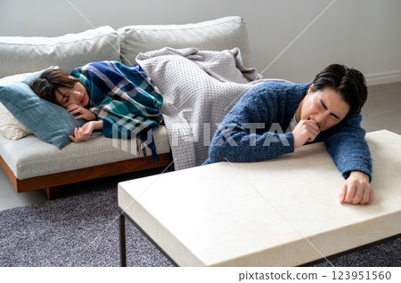 My family caught a cold and stayed in bed My family caught a cold and stayed in bed 123951560