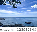 Tropical Beach Paradise with Crystal Clear Water and Rocky Shoreline in Phuket, Thailand 123952348