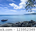 Tropical Beach Paradise with Crystal Clear Water and Rocky Shoreline in Phuket, Thailand 123952349