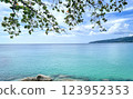 Tropical Beach Paradise with Crystal Clear Water and Rocky Shoreline in Phuket, Thailand 123952353