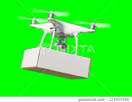 Isolated Unmanned Aircraft System (UAV) Quadcopter Drone Carrying Box Delivery In The Air Over A Green Screen. 123955500