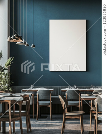 Wall art mockup in a modern cafe with a blank canvas on the wall. The cafe has blue and grey hues.  123955950