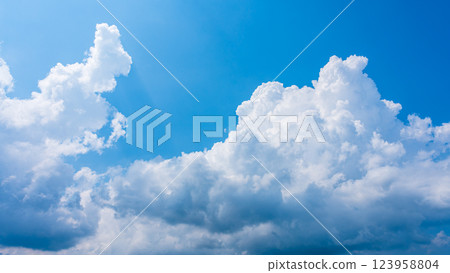 Cumulonimbus clouds in the summer blue sky Cumulonimbus clouds in the summer blue sky 123958804