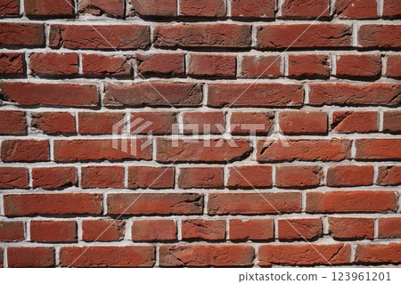 A vintage feel: A worn-out red brick wall A vintage feel: A worn-out red brick wall 123961201