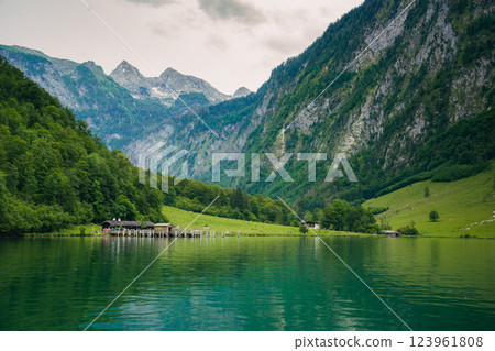 Konigssee Lake in Bavaria Germany with Church by the Lake White Boat Forested Mountain and Beautiful Sunny Trekking in Berchtesgaden German Alps. High quality photo 123961808