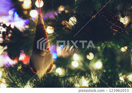 Christmas Tree with Book and Nativity Scene Festive Holiday Decorations and Cozy Seasonal Atmosphere. High quality photo 123962053