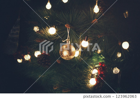 Christmas Tree with Book and Nativity Scene Festive Holiday Decorations and Cozy Seasonal Atmosphere. High quality photo 123962063
