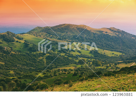 Mountain landscape Mountain ridge with orange sky 123963881