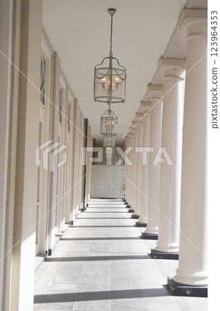 Light shines down the white corridor Light shines down the white corridor 123964353