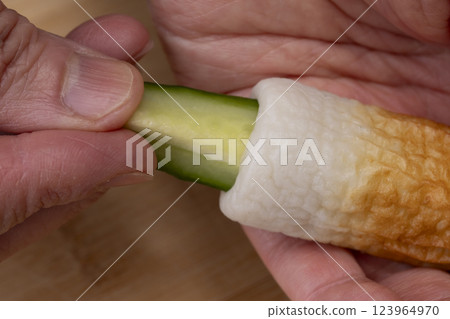 The process of making chikuwa cucumber The process of making chikuwa cucumber 123964970