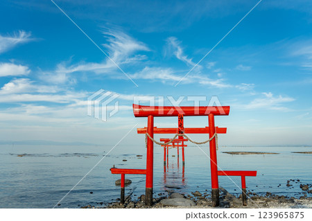 Tara Town, Saga Prefecture: The underwater torii gate of Ouo Shrine in the shallow waters of the Ariake Sea in autumn Tara Town, Saga Prefecture: The underwater torii gate of Ouo Shrine in the shallow waters of the Ariake Sea in autumn 123965875
