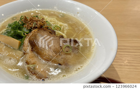 A photo of soy sauce ramen with delicious thick-cut pork slices A photo of soy sauce ramen with delicious thick-cut pork slices 123966024