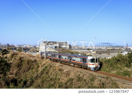 JR Central 313 series local train running on the Taketoyo Line JR Central 313 series local train running on the Taketoyo Line 123967847
