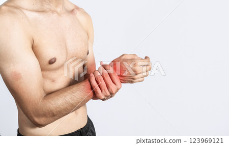 Close up of person with wrist pain, concept of man with pain in the hands, man with arthritis rubbing, person with pain in the wrist, Concept of arthritis in the wrist Close up of person with wrist pain, concept of man with pain in the hands, man with arthritis rubbing, person with pain in the wrist, Concept of arthritis in the wrist 123969121