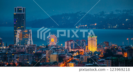 Batumi, Adjara, Georgia. Elevated view Ferris Wheel At Promenade In Miracle Park, Amusement City Park during Evening twilight night 123969218