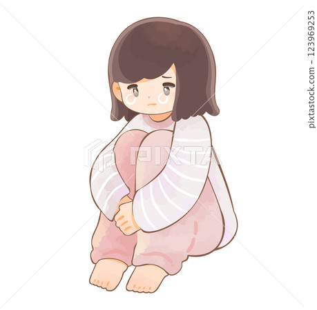 A child in pajamas crying with his knees hugged to his chest, refusing to go to school 123969253