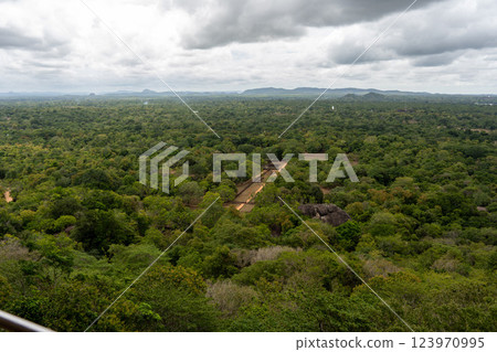 A magnificent view of Sigiriya under a cloudy sky A magnificent view of Sigiriya under a cloudy sky 123970995
