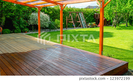 Close-up of a wooden deck - on the covered terrace - showing the process of restoration 123972199