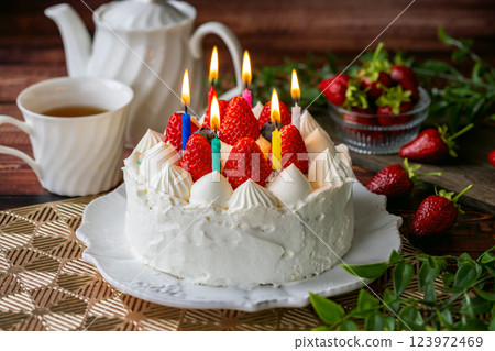 Whole cake, candles, fire 123972469
