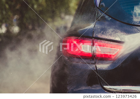 Car wash using high pressure water 123973426