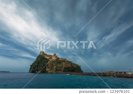 Ischia, Italy with Aragonese Castle in the Mediterranean at dusk Ischia, Italy with Aragonese Castle in the Mediterranean at dusk 123976101