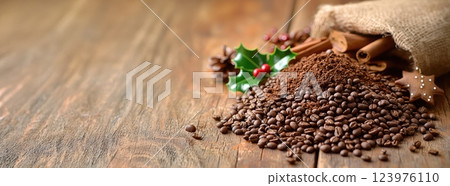 A delightful arrangement of festive coffee and a variety of spices displayed on a wooden table A delightful arrangement of festive coffee and a variety of spices displayed on a wooden table 123976110