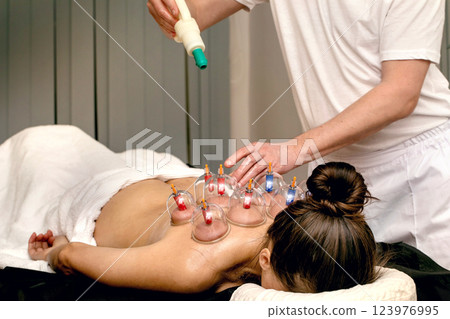 Professional massage therapist 123976995