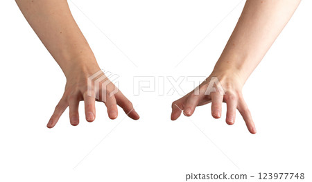 Hands reaching down, grasping and touching an unseen surface, fingers slightly curled in Hands reaching down, grasping and touching an unseen surface, fingers slightly curled in 123977748