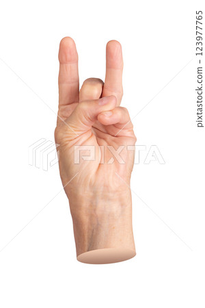 Elderly hand with index and ring fingers extended in an unusual gesture. Pinky curled inward, thumb Elderly hand with index and ring fingers extended in an unusual gesture. Pinky curled inward, thumb 123977765