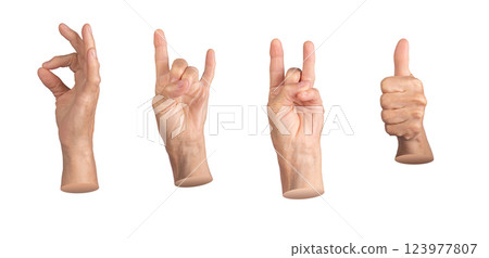 An elderly woman showing a hand gesture. Fingers in OK sign, with thumb up, and other hand making a 123977807
