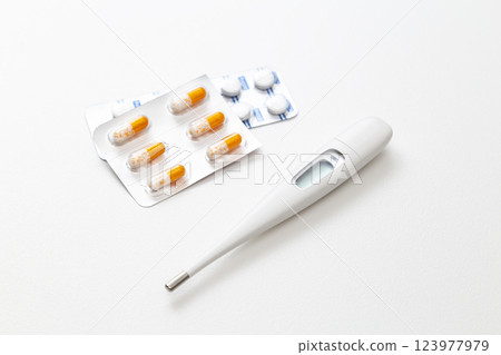 Medicine and thermometer Medicine and thermometer 123977979