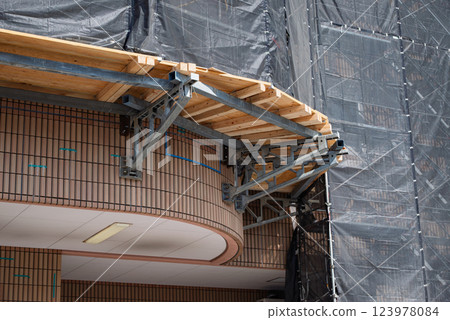 Exterior wall construction: Wall marking and bracket scaffolding Exterior wall construction: Wall marking and bracket scaffolding 123978084