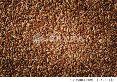 Flax seeds linseed as natural food background Flax seeds linseed as natural food background 123978518