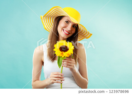 portrait attractive woman with sunflower portrait attractive woman with sunflower 123978696
