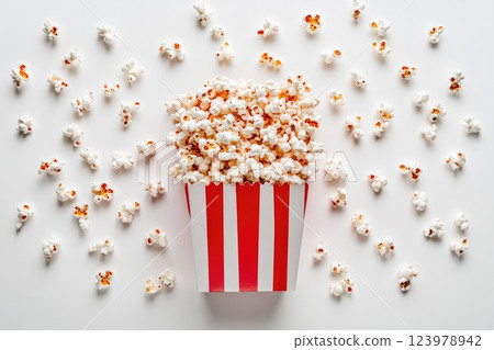 Close-up of a popcorn-filled paper box isolated on white Close-up of a popcorn-filled paper box isolated on white 123978942