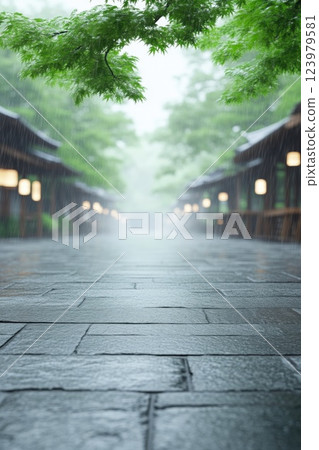 Japanese temple surrounded by lush green trees in fog 123979581