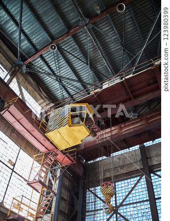 Industrial crane cabin inside factory 123980399