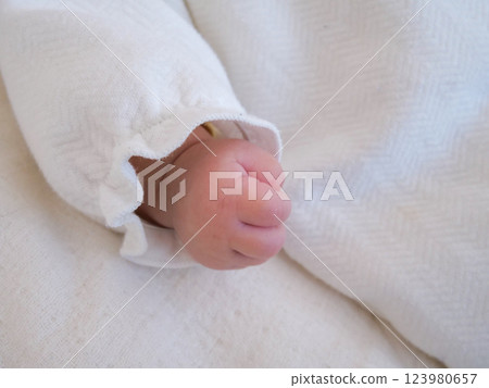 Baby turning over Baby turning over 123980657