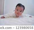Baby turning over 123980658