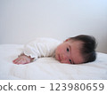 Baby turning over 123980659
