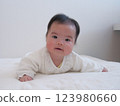 Baby turning over 123980660