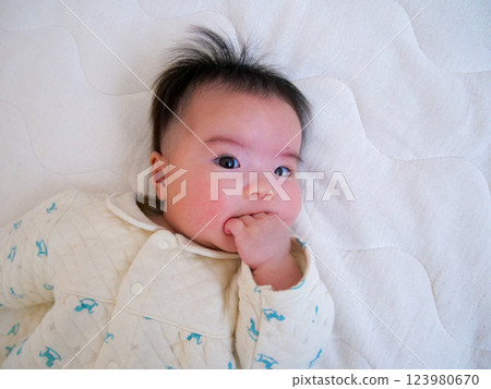 Baby to give up for the first time 123980670