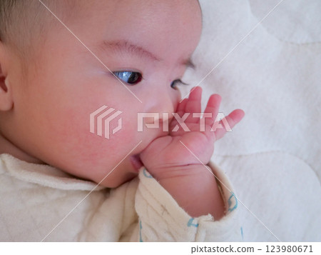 Baby to give up for the first time Baby to give up for the first time 123980671