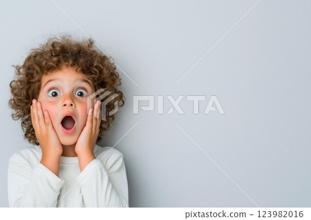 Young girl discovering something new 123982016