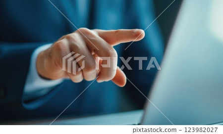 Angry boss reprimanding employee with finger pointing at screen Angry boss reprimanding employee with finger pointing at screen 123982027