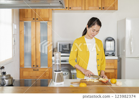 Senior woman in the kitchen 123982374
